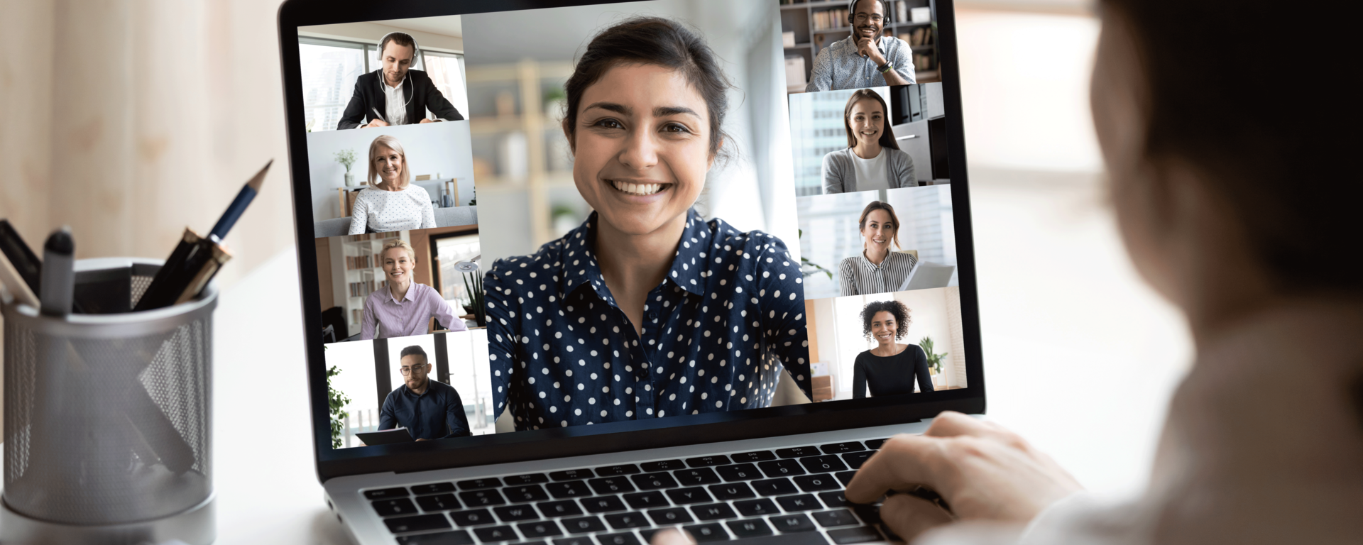 People interacting with each other on a video conference call