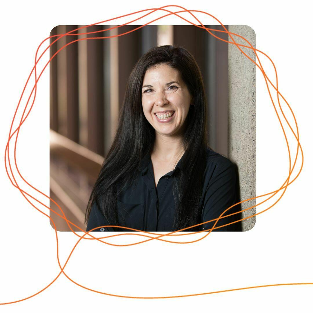Morgan Vanek, a white woman with long dark hair, is smiling and looking ahead with the 3QTL orange squiggle speech bubble around the photo.